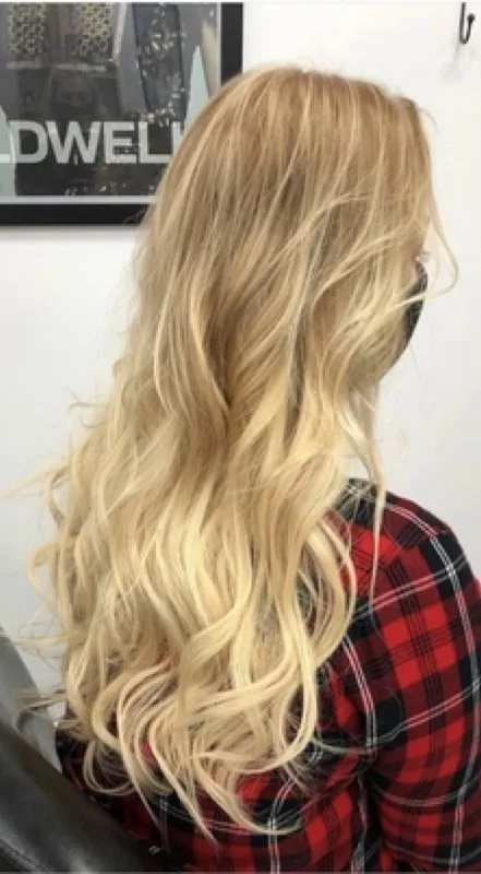 Long blonde balayage waves by Salon 151