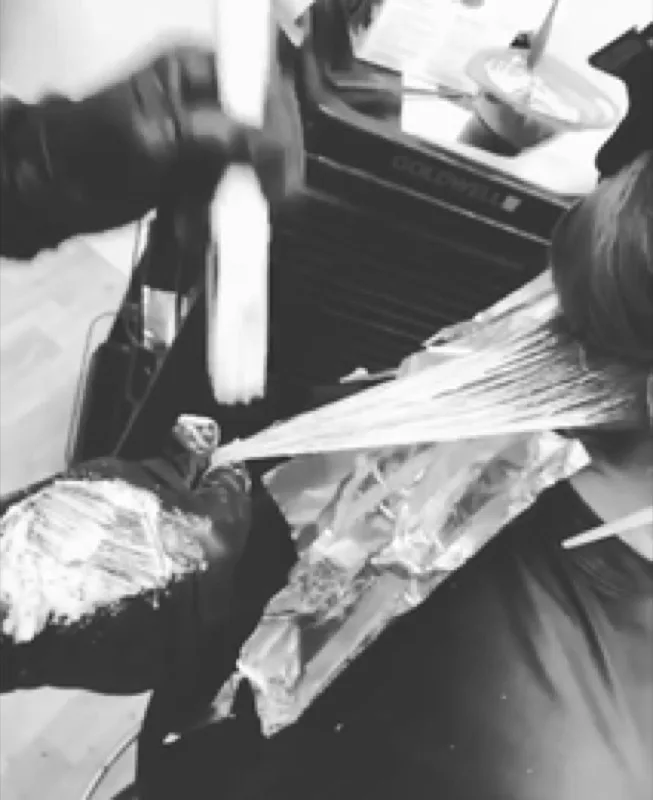 Foil color application in progress at Salon 151